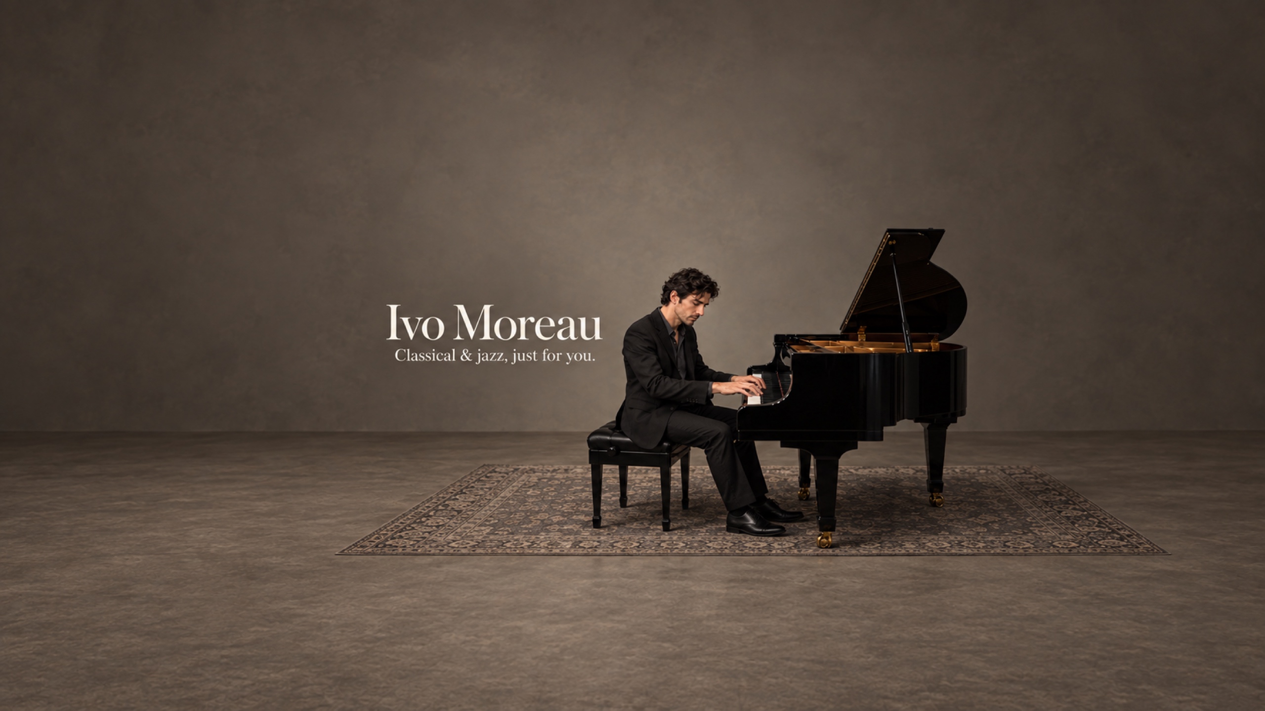 Ivo Moreau playing a grand piano in a spacious, softly lit hall